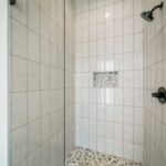 Secondary shower with tile surround
