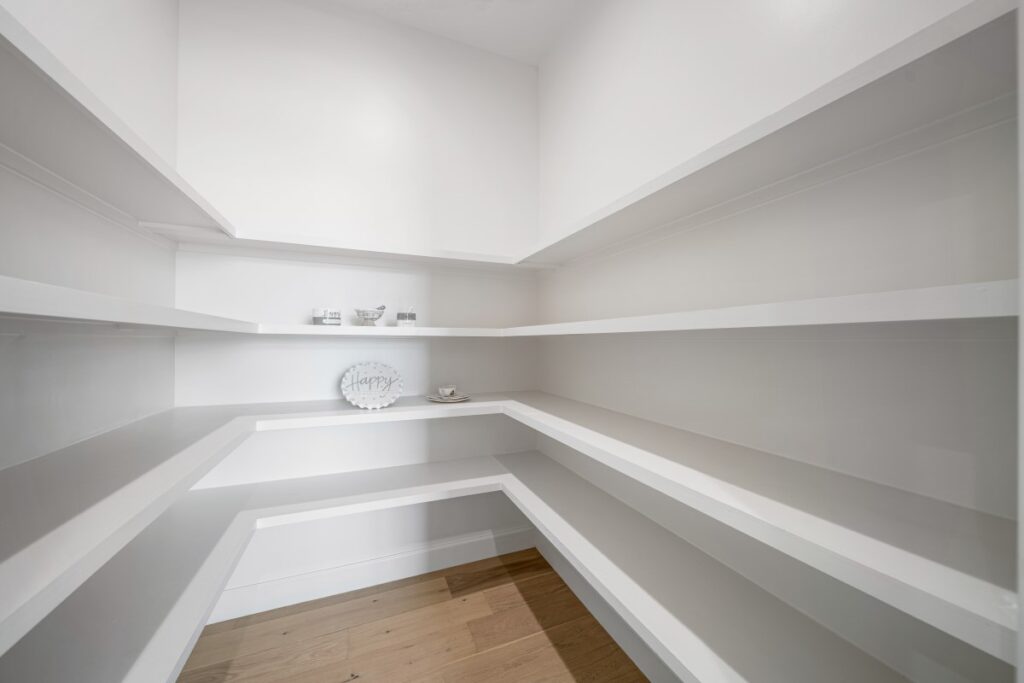 Huge walk-in pantry with shelving